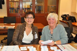 Volunteers greet guests at a museum event 