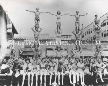 Gymnasts Balancing Gymnasts Balancing at Muscle Beach on a platform