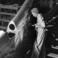 Woman riveter working on plane (1998.1.1273)