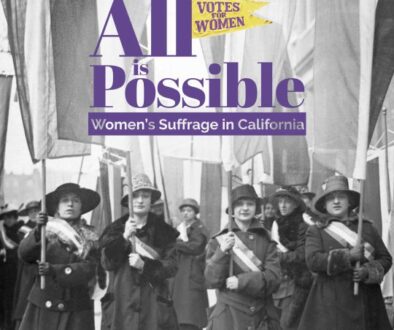 Women suffragists marching in street