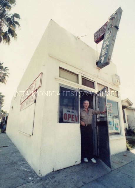 Nolan Gist in the doorway of his market at the corner of 19th Street and Broadway Avenue in Santa Monica.