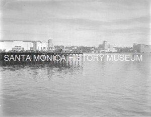 view of the Santa Monica pier and coastline from in the water