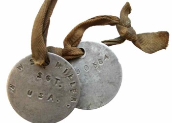 WWI dog tags on a cloth string