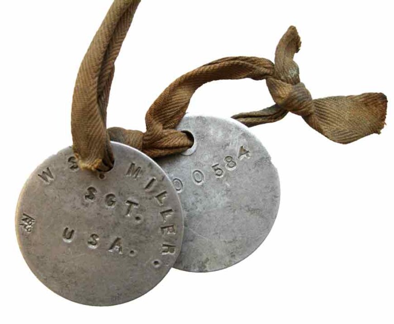 WWI dog tags on a cloth string