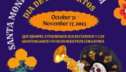 Day of the Dead graphic on purple with orange flowers