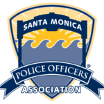 Santa Monica {Police Officers Association logo text over yellow and blue shield