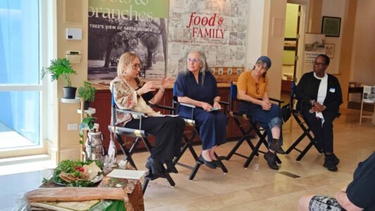 Parand Youssefi speaking at the Santa Monica History Museum event "Breaking Bread"