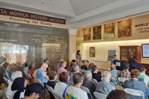 Book Talk with Nina Fresco - First Around the World Nina Fresco talking about her book First Around the World at the Santa Monica History Museum, with audience in foreground